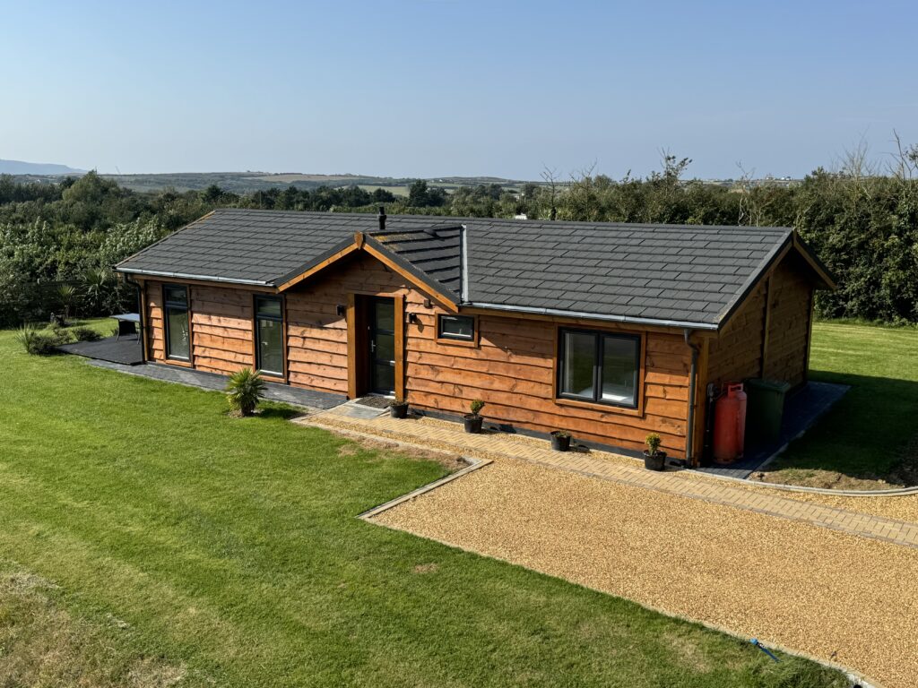 Timber clad lodge for sale in Bude